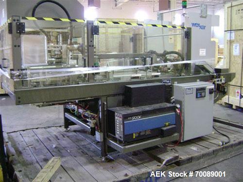 Used Wexxar Tray Former, model Delta 3. Nordson 3700 "Vista" hot glue applicator, 15 lb tomato tray format, easy load magazine, machine management system with tri-lite beacon, manufactured 2002.