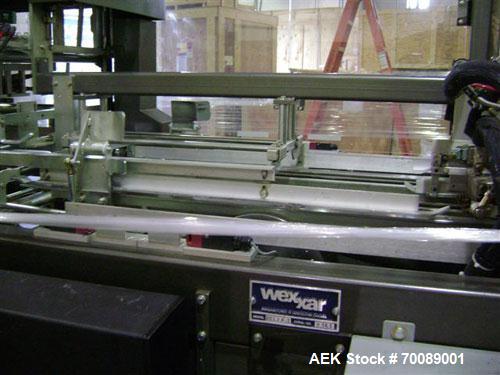 Used Wexxar Tray Former, model Delta 3. Nordson 3700 "Vista" hot glue applicator, 15 lb tomato tray format, easy load magazine, machine management system with tri-lite beacon, manufactured 2002.