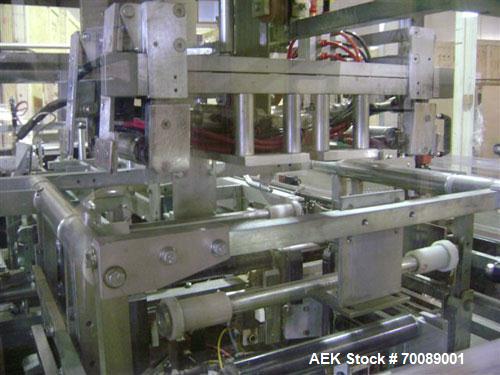 Used Wexxar Tray Former, model Delta 3. Nordson 3700 "Vista" hot glue applicator, 15 lb tomato tray format, easy load magazine, machine management system with tri-lite beacon, manufactured 2002.