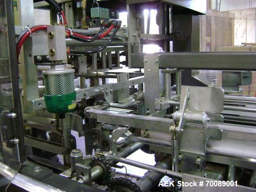 Used Wexxar Tray Former, model Delta 3. Nordson 3700 "Vista" hot glue applicator, 15 lb tomato tray format, easy load magazine, machine management system with tri-lite beacon, manufactured 2002.