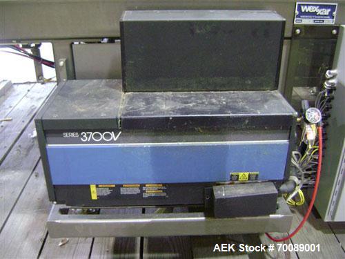 Used Wexxar Tray Former, model Delta 3. Nordson 3700 "Vista" hot glue applicator, 15 lb tomato tray format, easy load magazine, machine management system with tri-lite beacon, manufactured 2002.