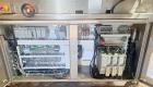 Used Delkor Automatic Hot Melt Glue Tray Former, Model TFS. Machine is rated for speeds up to 80 trays per minute (depending on product and package sizes). Has a layflat tray size range of: 5