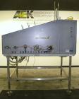 Used Econocorp Econoseal Automatic Tray Former, Model 7228, Carbon Steel. Capable of speeds up to 20 trays per minute. Has a tray size range: width 6