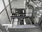 Used SWF Model 1T4 Trayformer. Stainless steel frame capable of speeds up to 35 trays per miniute depending on case size.Has a tray size range:7