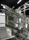 Used SWF Model 1T4 Trayformer. Stainless steel frame capable of speeds up to 35 trays per miniute depending on case size.Has a tray size range:7