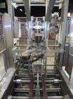 Used SWF Model 1T4 Trayformer. Stainless steel frame capable of speeds up to 35 trays per miniute depending on case size.Has a tray size range:7