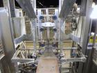 Used SWF Model 1T4 Trayformer. Stainless steel frame capable of speeds up to 35 trays per miniute depending on case size.Has a tray size range:7