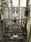 Used SWF Model 1T4 Trayformer. Stainless steel frame capable of speeds up to 35 trays per miniute depending on case size.Has a tray size range:7