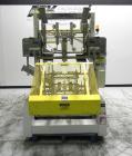 Used SWF Model 1T4 Glue Tray Former with Lidder. Glue tray former capable of speeds up to 35 trays per minute depending on case size. Has vacuum blank tray pick up. Has a tray size range: 7