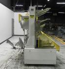 Used SWF Model 1T4 Glue Tray Former with Lidder. Glue tray former capable of speeds up to 35 trays per minute depending on case size. Has vacuum blank tray pick up. Has a tray size range: 7
