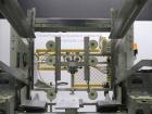 Used SWF Model 1T4 Glue Tray Former with Lidder. Glue tray former capable of speeds up to 35 trays per minute depending on case size. Has vacuum blank tray pick up. Has a tray size range: 7