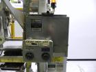 Used SWF Model 1T4 Glue Tray Former with Lidder. Glue tray former capable of speeds up to 35 trays per minute depending on case size. Has vacuum blank tray pick up. Has a tray size range: 7