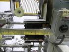 Used SWF Model 1T4 Glue Tray Former with Lidder. Glue tray former capable of speeds up to 35 trays per minute depending on case size. Has vacuum blank tray pick up. Has a tray size range: 7