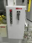Used SWF Model 1T4 Glue Tray Former with Lidder. Glue tray former capable of speeds up to 35 trays per minute depending on case size. Has vacuum blank tray pick up. Has a tray size range: 7