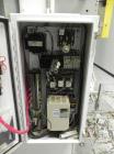 Used SWF Model 1T4 Glue Tray Former with Lidder. Glue tray former capable of speeds up to 35 trays per minute depending on case size. Has vacuum blank tray pick up. Has a tray size range: 7
