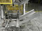 Used SWF Model 1T4 Glue Tray Former with Lidder. Glue tray former capable of speeds up to 35 trays per minute depending on case size. Has vacuum blank tray pick up. Has a tray size range: 7