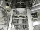Used SWF Model 1T4 Glue Tray Former with Lidder. Glue tray former capable of speeds up to 35 trays per minute depending on case size. Has vacuum blank tray pick up. Has a tray size range: 7