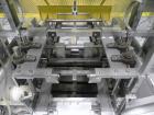 Used SWF Model 1T4 Glue Tray Former with Lidder. Glue tray former capable of speeds up to 35 trays per minute depending on case size. Has vacuum blank tray pick up. Has a tray size range: 7