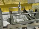 Used SWF Model 1T4 Glue Tray Former with Lidder. Glue tray former capable of speeds up to 35 trays per minute depending on case size. Has vacuum blank tray pick up. Has a tray size range: 7