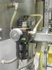 Used SWF Model 1T4 Glue Tray Former with Lidder. Glue tray former capable of speeds up to 35 trays per minute depending on case size. Has vacuum blank tray pick up. Has a tray size range: 7
