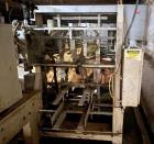 Used SWF Glue Seal Tray Former, Model IT4. Machine is capable of speeds up to 35 Trays per minute (depending on case size). Has a tray size range: 7