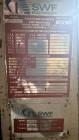 Used SWF Glue Seal Tray Former, Model IT4. Machine is capable of speeds up to 35 Trays per minute (depending on case size). Has a tray size range: 7