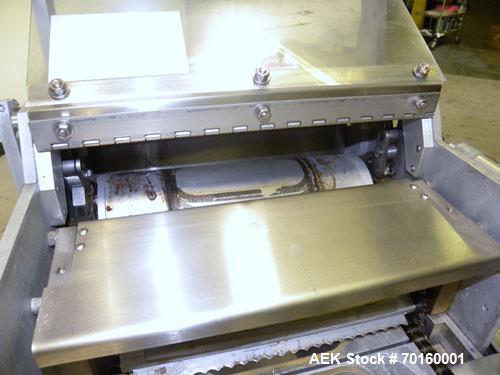 Used Ameripak Filled Tray Sealer, Model 145. Capable of speeds up to 30 trays per minute depending on tray size, material, and feeding capaility. Single parent roll, 3’’ I.D. core, maximum roll capac...