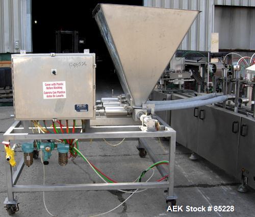Used FEMC Inline Tray Filler/Lidder Line Consisting Of: (1) 6" wide x 80" long plastic belt infeed conveyor, model 1253-114, serial #7301, driven by an approximate 1/4 HP gearmotor. (1) Air operated ...