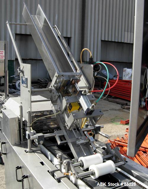Used FEMC Inline Tray Filler/Lidder Line Consisting Of: (1) 6" wide x 80" long plastic belt infeed conveyor, model 1253-114, serial #7301, driven by an approximate 1/4 HP gearmotor. (1) Air operated ...