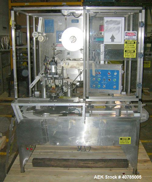 Used Fords Holmatic (Packaging Technologies) Model HSC - 50S tamper evident heat sealer capable of speeds from 50 to 100 cpm. Container size range: Diameter 20 to 178mm or 0.8 to 7.0"; Height up to 2...