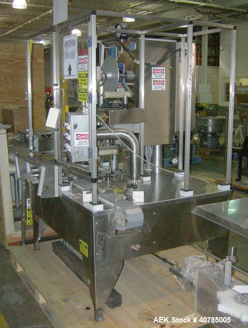 Used Fords Holmatic (Packaging Technologies) Model HSC - 50S tamper evident heat sealer capable of speeds from 50 to 100 cpm. Container size range: Diameter 20 to 178mm or 0.8 to 7.0"; Height up to 2...