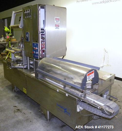 Used Holmatic CBS-18-4F Tamper Evident Inline Heat Sealer. Capable of speeds up to 160 cpm. Three seal head system last running rectangular container. Container range: diameter 1.5 to 5.5" or 38 - 12...