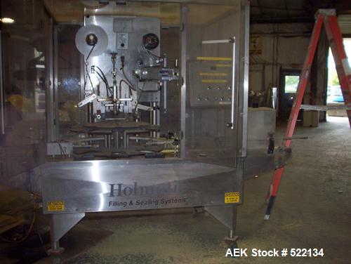 USED: Holmatic model HSC-50-SS container sealer, capable up to 35 cpm. Container size range .8"-7" diameter, .8"-6.5" rectangle/square, 8" max height. Built 1999. 1/60/240V. This is a conduction seal...