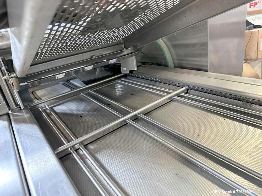 Used- Multivac Stainless Steel Automatic Food Tray Sealer, Model T-300. Capable of speeds from 12 - 30 packs per minute (6 -...