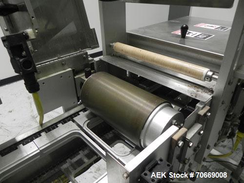 Used Oliver Model 2108 9999 0.11 Trayveyor Tray Film Sealer. Continuous motion machine can perform at up to 500" per minute using clear or Print Registered. Has a tray size range: Width up to 8.5", c...