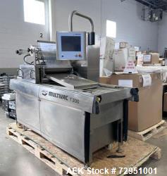 https://www.aaronequipment.com/Images/ItemImages/Packaging-Equipment/Tray-Sealers-Roll-Stock-or-Die-Cut/medium/Multivac-T-300_72951001_aa.jpeg