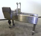 Used Ameripak Filled Tray Sealer, Model 145. Capable of speeds up to 30 trays per minute depending on tray size, material, and feeding capaility. Single parent roll, 3’’ I.D. core, maximum roll capac...