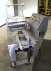 Used Ameripak Filled Tray Sealer, Model 145. Capable of speeds up to 30 trays per minute depending on tray size, material, and feeding capaility. Single parent roll, 3’’ I.D. core, maximum roll capac...