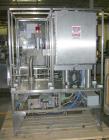 Used Fords Holmatic (Packaging Technologies) Model HSC - 50S tamper evident heat sealer capable of speeds from 50 to 100 cpm. Container size range: Diameter 20 to 178mm or 0.8 to 7.0