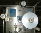 Used Fords Holmatic (Packaging Technologies) Model HSC - 50S tamper evident heat sealer capable of speeds from 50 to 100 cpm. Container size range: Diameter 20 to 178mm or 0.8 to 7.0