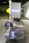 Used Holmatic CBS-18-4F Tamper Evident Inline Heat Sealer. Capable of speeds up to 160 cpm. Three seal head system last running rectangular container. Container range: diameter 1.5 to 5.5
