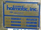 Used Holmatic CBS-18-4F Tamper Evident Inline Heat Sealer. Capable of speeds up to 160 cpm. Three seal head system last running rectangular container. Container range: diameter 1.5 to 5.5