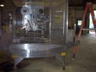 USED: Holmatic model HSC-50-SS container sealer, capable up to 35 cpm. Container size range .8