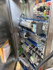 Used- Multivac Stainless Steel Automatic Food Tray Sealer, Model T-300. Capable of speeds from 12 - 30 packs per minute (6 -...