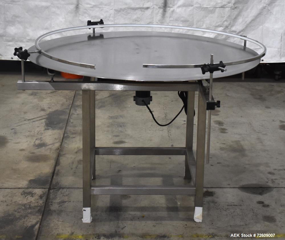 Used 48" Rotating Accumulation Table, Stainless Steel. Has Dart 15 series speed controller. Driven by 1/11 (HP/CV) DC gearmotor. Mounted on a stainless steel frame. No manufacturers tag.