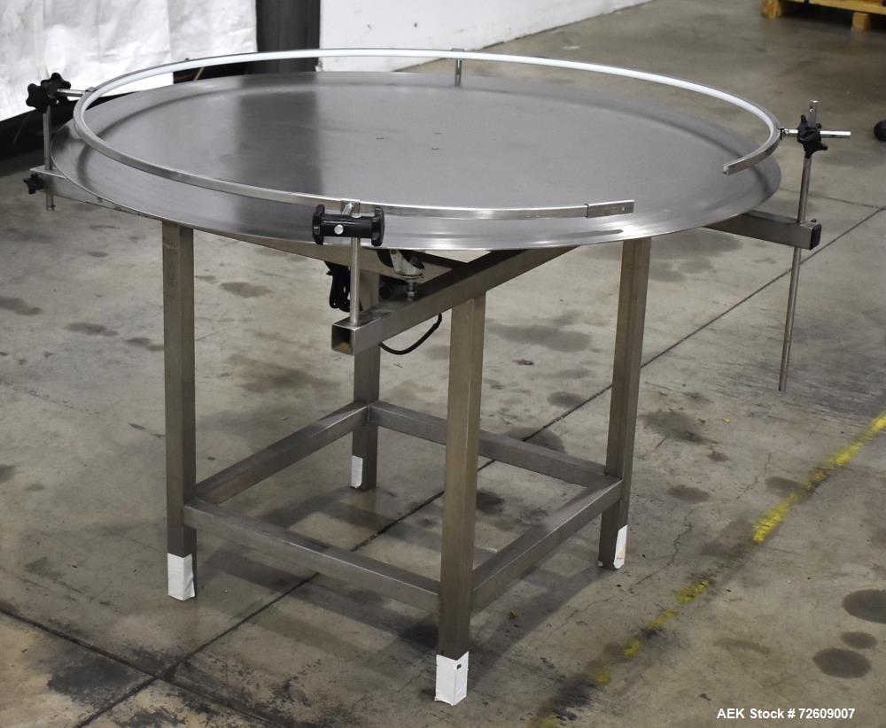 Used 48" Rotating Accumulation Table, Stainless Steel. Has Dart 15 series speed controller. Driven by 1/11 (HP/CV) DC gearmotor. Mounted on a stainless steel frame. No manufacturers tag.