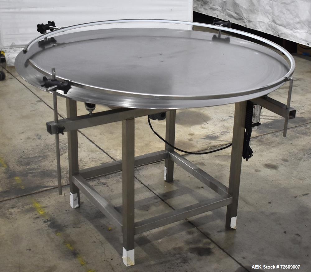 Used 48" Rotating Accumulation Table, Stainless Steel. Has Dart 15 series speed controller. Driven by 1/11 (HP/CV) DC gearmotor. Mounted on a stainless steel frame. No manufacturers tag.