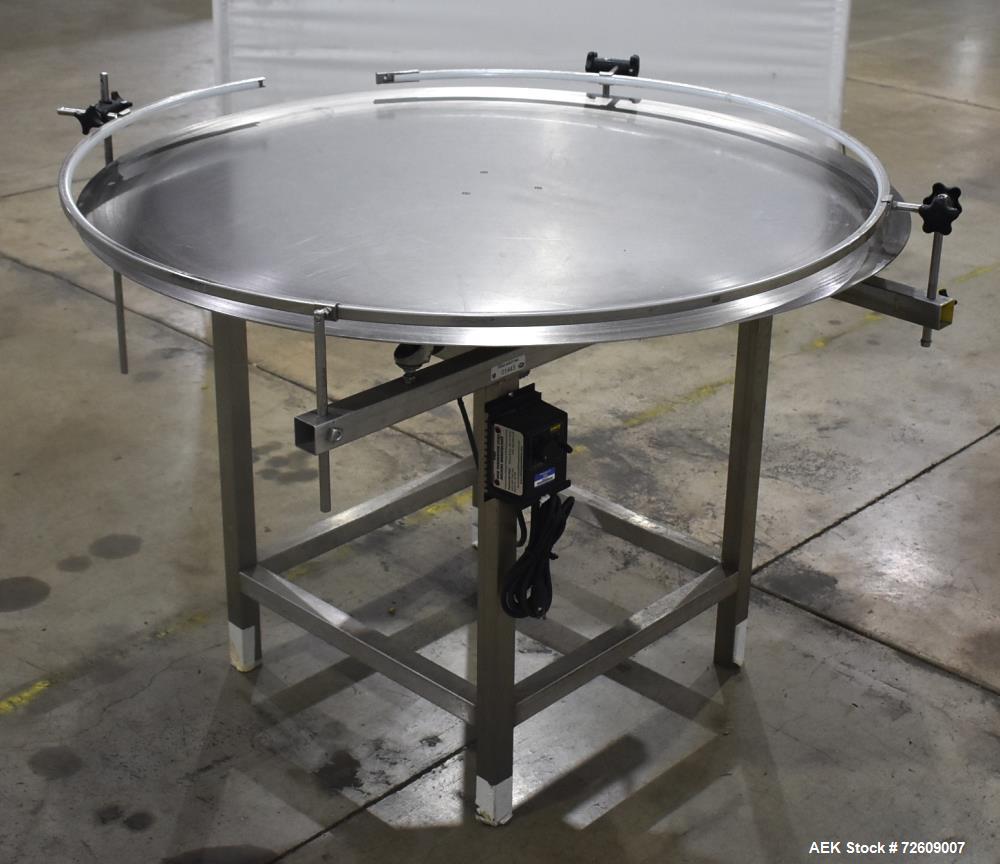 Used 48" Rotating Accumulation Table, Stainless Steel. Has Dart 15 series speed controller. Driven by 1/11 (HP/CV) DC gearmotor. Mounted on a stainless steel frame. No manufacturers tag.