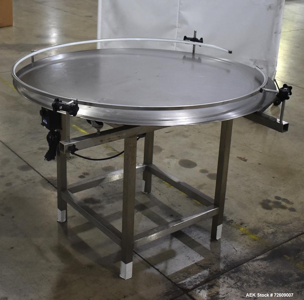 Used 48" Rotating Accumulation Table, Stainless Steel. Has Dart 15 series speed controller. Driven by 1/11 (HP/CV) DC gearmotor. Mounted on a stainless steel frame. No manufacturers tag.