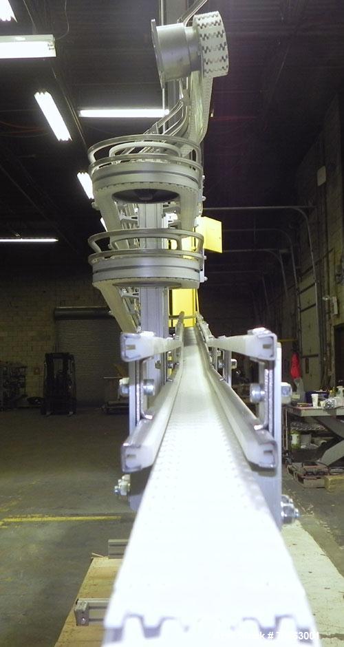 Used Flexlink Alpine XL 63 mm Buffer Vertical J Shape Chain Conveyor. Top section 100" into 9" 180 degree turn into four 72" sections with four 9" 180 degree turns. Bottom section 162" long. 80" Inpu...